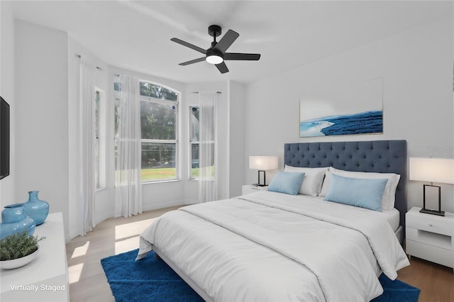 108 Pearlwood St, Orlando, FL 32811 - bedroom with wood finished floors and a ceiling fan