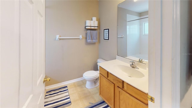 full bath featuring baseboards, walk in shower, toilet, tile patterned floors, and vanity