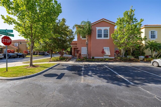4722 Flagler Beach Way, Kissimmee, FL 34746 - exterior space with traffic signs and curbs