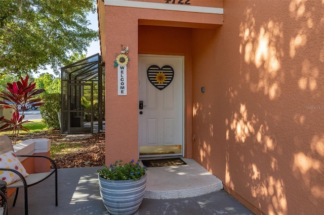 4722 Flagler Beach Way, Kissimmee, FL 34746 - doorway to property with stucco siding