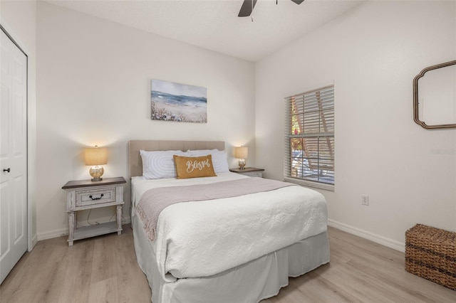 4722 Flagler Beach Way, Kissimmee, FL 34746 - bedroom with baseboards, wood finished floors, ceiling fan, and a closet