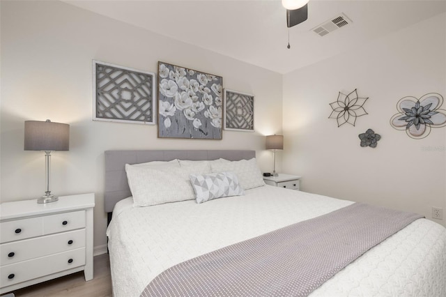 4722 Flagler Beach Way, Kissimmee, FL 34746 - bedroom with wood finished floors, visible vents, and a ceiling fan
