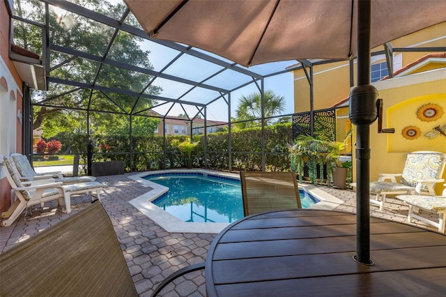 4722 Flagler Beach Way, Kissimmee, FL 34746 - pool featuring a patio and glass enclosure