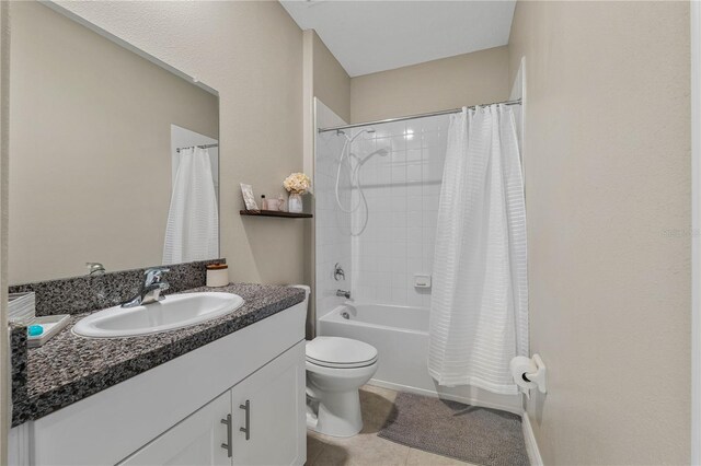 13475 Crest Lake Dr, Hudson, FL 34669 - full bath featuring tile patterned floors, shower / tub combo, toilet, and vanity