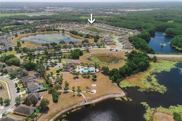 13475 Crest Lake Dr, Hudson, FL 34669 - aerial view with a residential view, a water view, and a forest view