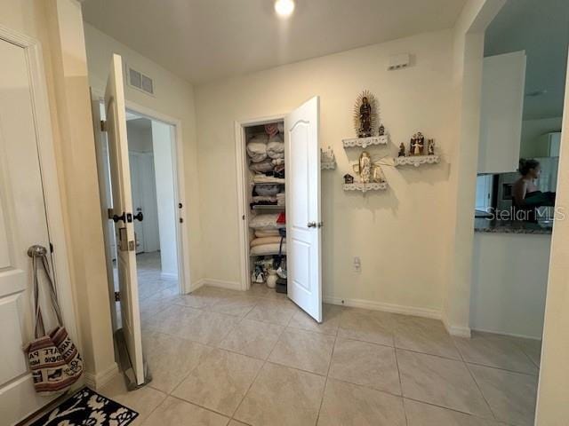 4373 Deleon St, Haines City, FL 33844 - corridor featuring visible vents, baseboards, and light tile patterned flooring