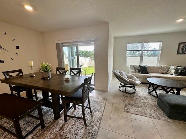 4373 Deleon St, Haines City, FL 33844 - dining space with light tile patterned flooring
