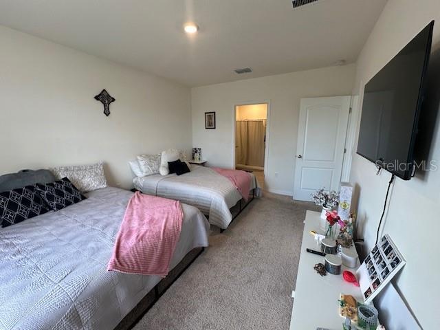 4373 Deleon St, Haines City, FL 33844 - bedroom featuring carpet floors and visible vents