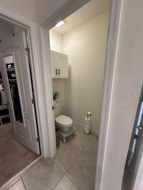 4373 Deleon St, Haines City, FL 33844 - bathroom featuring tile patterned floors and toilet