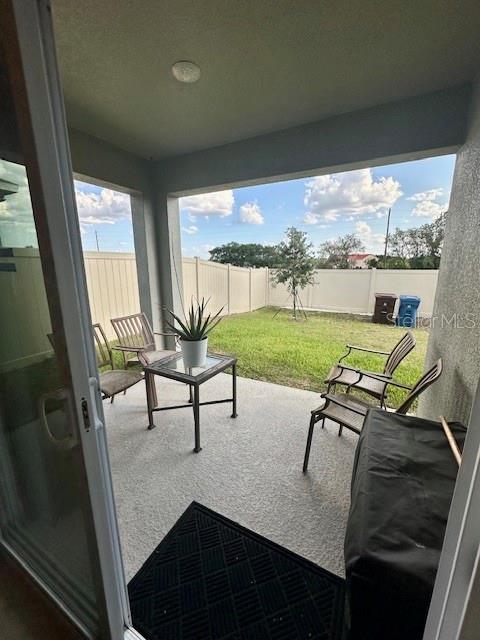 4373 Deleon St, Haines City, FL 33844 - view of patio / terrace featuring a fenced backyard