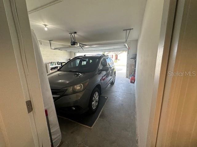 4373 Deleon St, Haines City, FL 33844 - garage featuring a garage door opener