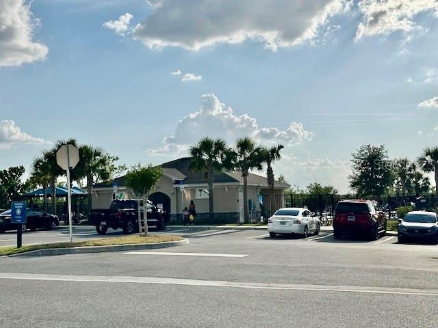 4373 Deleon St, Haines City, FL 33844 - view of road featuring traffic signs and curbs