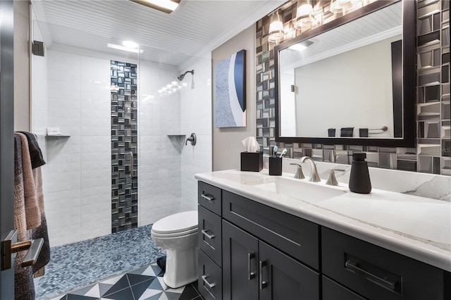full bath featuring walk in shower, toilet, vanity, tile patterned floors, and crown molding