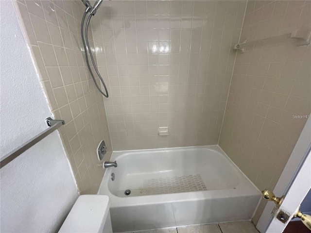 full bathroom with tile patterned flooring and bathtub / shower combination