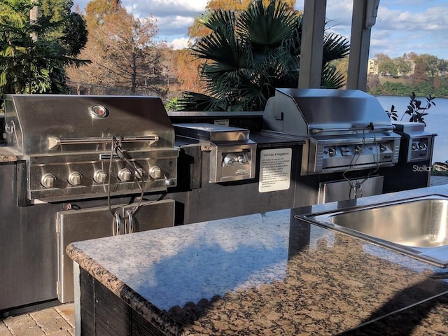 view of patio / terrace with area for grilling and exterior kitchen