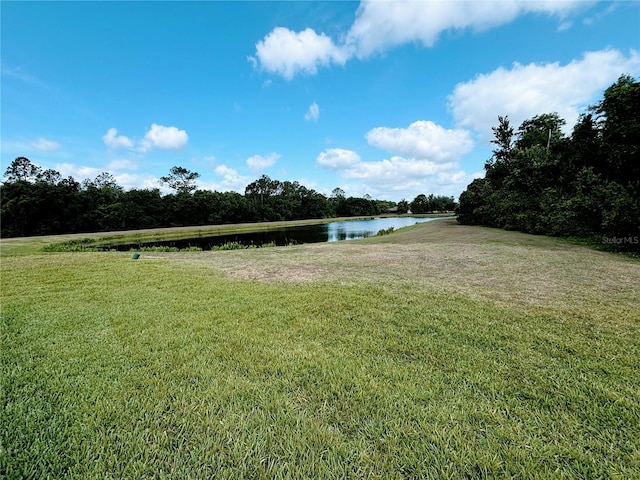 exterior space with a water view