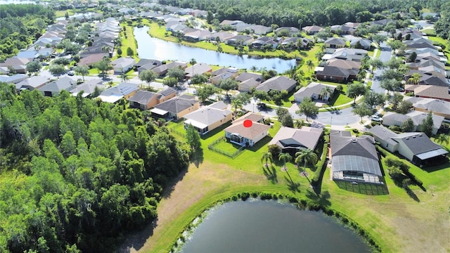 bird's eye view with a water view and a residential view