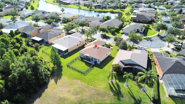 aerial view with a water view and a residential view