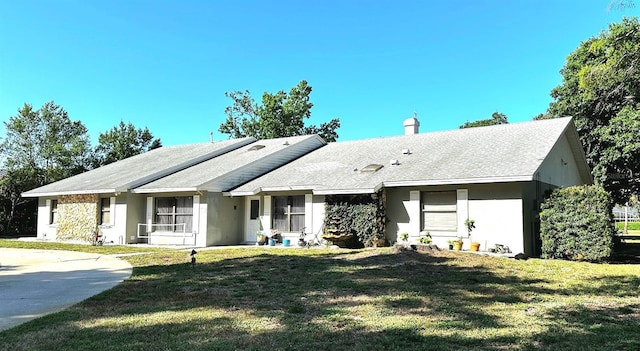 3328 Wax Berry Ct, Windermere, FL 34786 - view of front of home with stucco siding and a front lawn