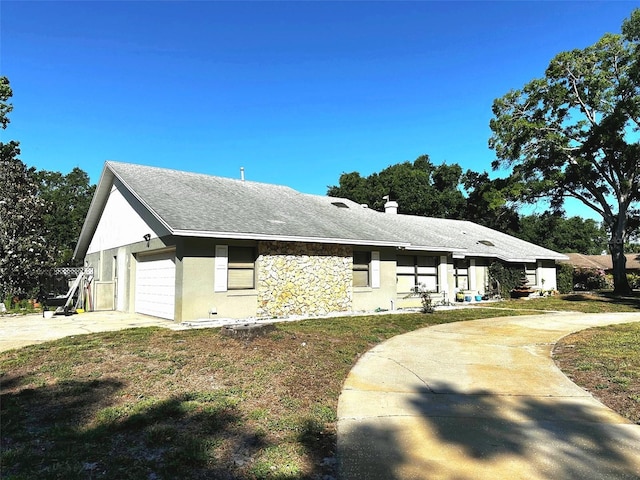 3328 Wax Berry Ct, Windermere, FL 34786 - view of front facade with concrete driveway, an attached garage, a shingled roof, and stucco siding