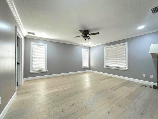3328 Wax Berry Ct, Windermere, FL 34786 - spare room with crown molding, a ceiling fan, light wood-type flooring, and visible vents