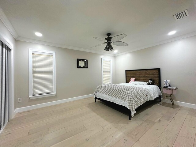 3328 Wax Berry Ct, Windermere, FL 34786 - bedroom featuring crown molding, baseboards, light wood-style flooring, and visible vents