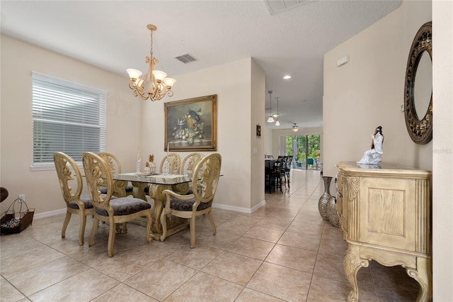 dining space featuring visible vents, light tile patterned floors, baseboards, an inviting chandelier, and recessed lighting