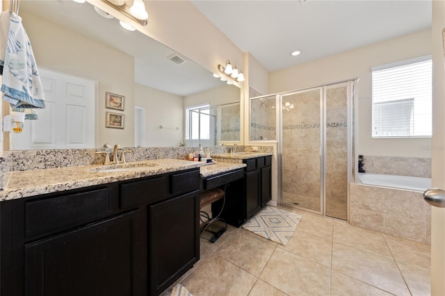 bathroom with visible vents, a garden tub, vanity, tile patterned floors, and a shower stall