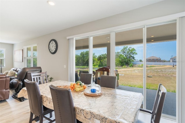 dining area with light wood-type flooring