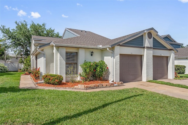 98 Lakepointe Cir, Kissimmee, FL 34743 - ranch-style house with driveway, roof with shingles, an attached garage, stucco siding, and a front lawn