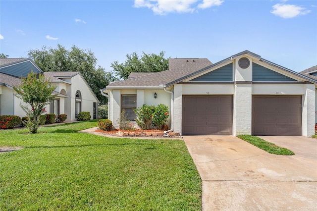 98 Lakepointe Cir, Kissimmee, FL 34743 - single story home with a front lawn, driveway, a garage, and stucco siding