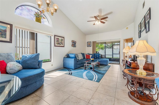 98 Lakepointe Cir, Kissimmee, FL 34743 - tiled living area with visible vents, high vaulted ceiling, and ceiling fan with notable chandelier