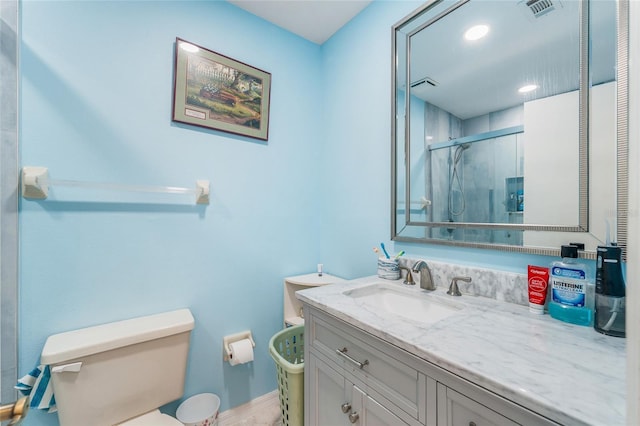 98 Lakepointe Cir, Kissimmee, FL 34743 - bathroom with visible vents, vanity, toilet, and a shower stall
