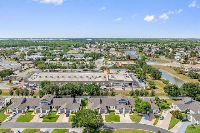 98 Lakepointe Cir, Kissimmee, FL 34743 - drone / aerial view featuring a residential view and a water view