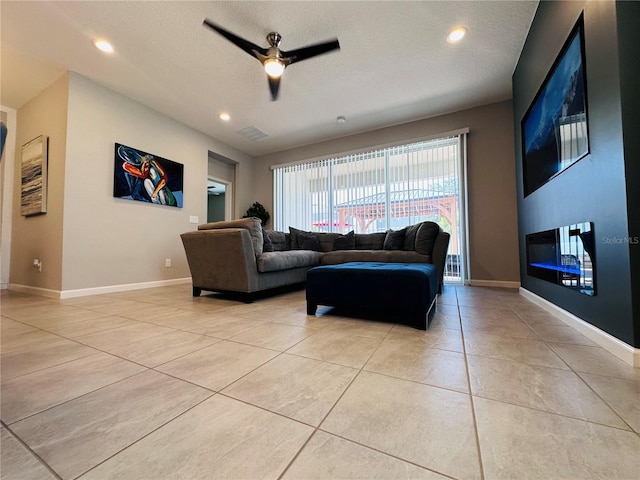 1321 Yorkdale Rd, Davenport, FL 33837 - living room featuring baseboards, a ceiling fan, light tile patterned flooring, and recessed lighting