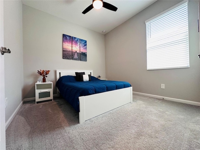 1321 Yorkdale Rd, Davenport, FL 33837 - carpeted bedroom with baseboards and a ceiling fan