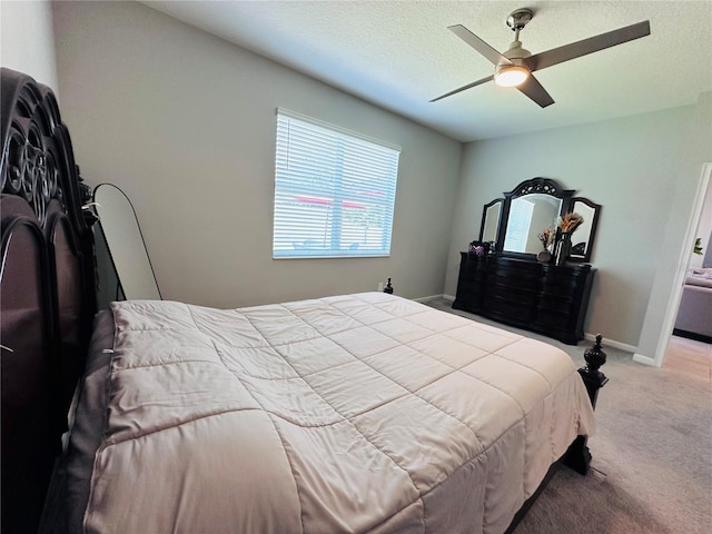 1321 Yorkdale Rd, Davenport, FL 33837 - bedroom with baseboards, carpet flooring, a textured ceiling, and ceiling fan