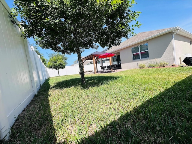 1321 Yorkdale Rd, Davenport, FL 33837 - view of yard featuring a gazebo, a fenced backyard, and a patio