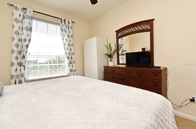 2778 Almaton Loop Unit 403, Kissimmee, FL 34747 - carpeted bedroom featuring baseboards and ceiling fan