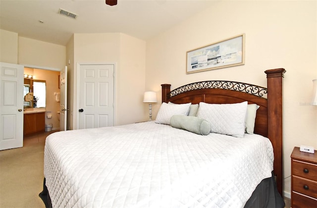 2778 Almaton Loop Unit 403, Kissimmee, FL 34747 - bedroom featuring carpet flooring, ceiling fan, visible vents, and ensuite bathroom