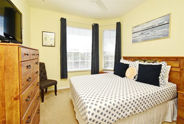 2778 Almaton Loop Unit 403, Kissimmee, FL 34747 - bedroom featuring a ceiling fan, baseboards, and light colored carpet