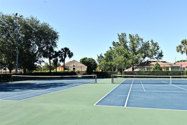 2778 Almaton Loop Unit 403, Kissimmee, FL 34747 - view of tennis court with fence and community basketball court