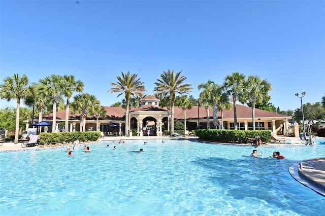 2778 Almaton Loop Unit 403, Kissimmee, FL 34747 - community pool featuring a patio