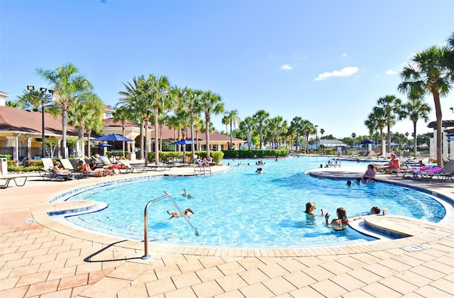 2778 Almaton Loop Unit 403, Kissimmee, FL 34747 - community pool featuring a patio area