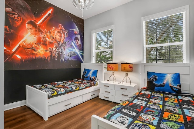 1501 Northern Harrier Way Unit 101, Kissimmee, FL 34747 - bedroom featuring wood finished floors