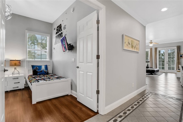 1501 Northern Harrier Way Unit 101, Kissimmee, FL 34747 - interior space featuring baseboards, recessed lighting, wood finished floors, and french doors
