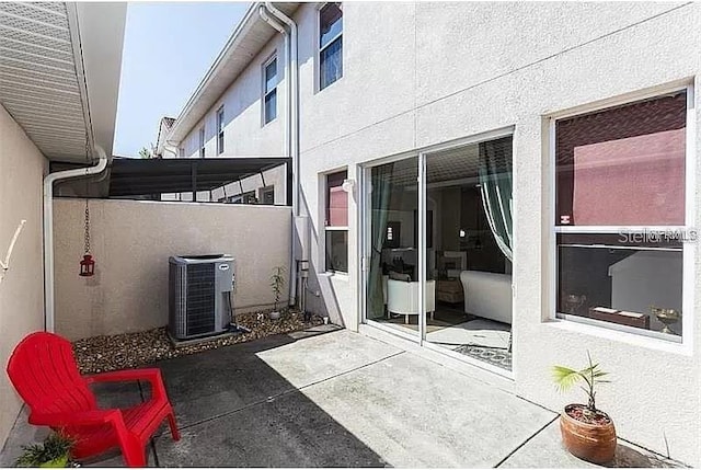 view of patio / terrace featuring central AC unit
