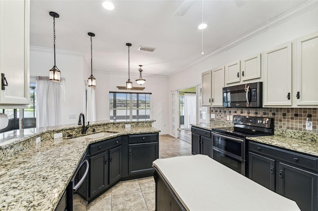 759 Glendora Rd, Kissimmee, FL 34759 - kitchen featuring a sink, double oven range, light tile patterned flooring, backsplash, and ornamental molding