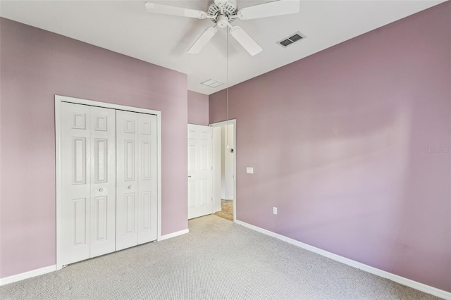 759 Glendora Rd, Kissimmee, FL 34759 - unfurnished bedroom featuring carpet, baseboards, a closet, and a ceiling fan
