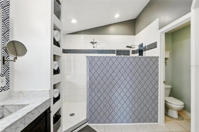 full bath featuring vanity, toilet, tile patterned floors, recessed lighting, and a shower stall